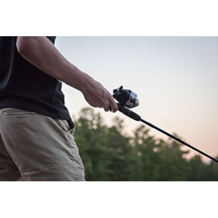 Fisherman Fishing with Baistcaster Reel