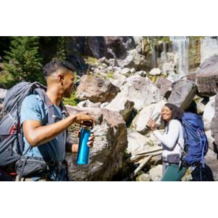 hikers drinking water bottles