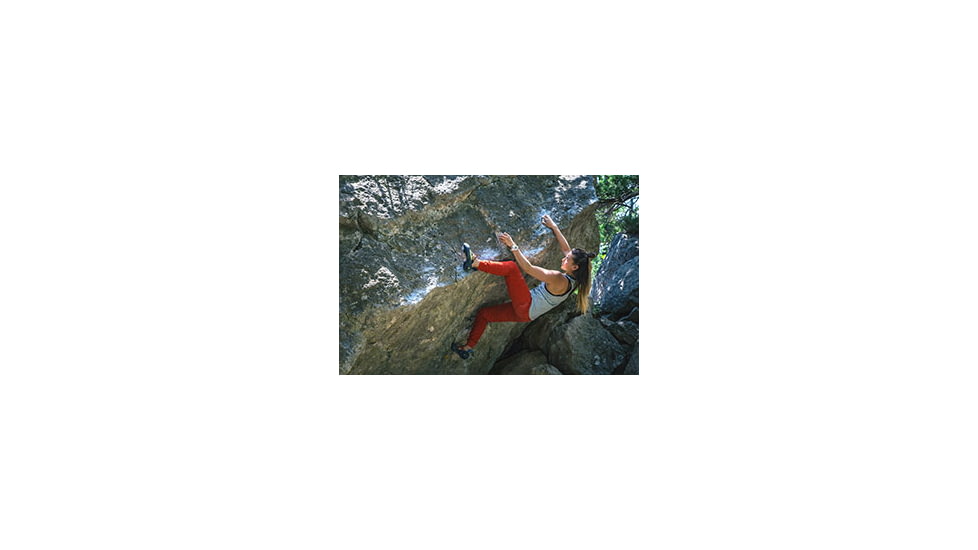 Athletic Woman Free Climbing Wearing Bouldering Shoes